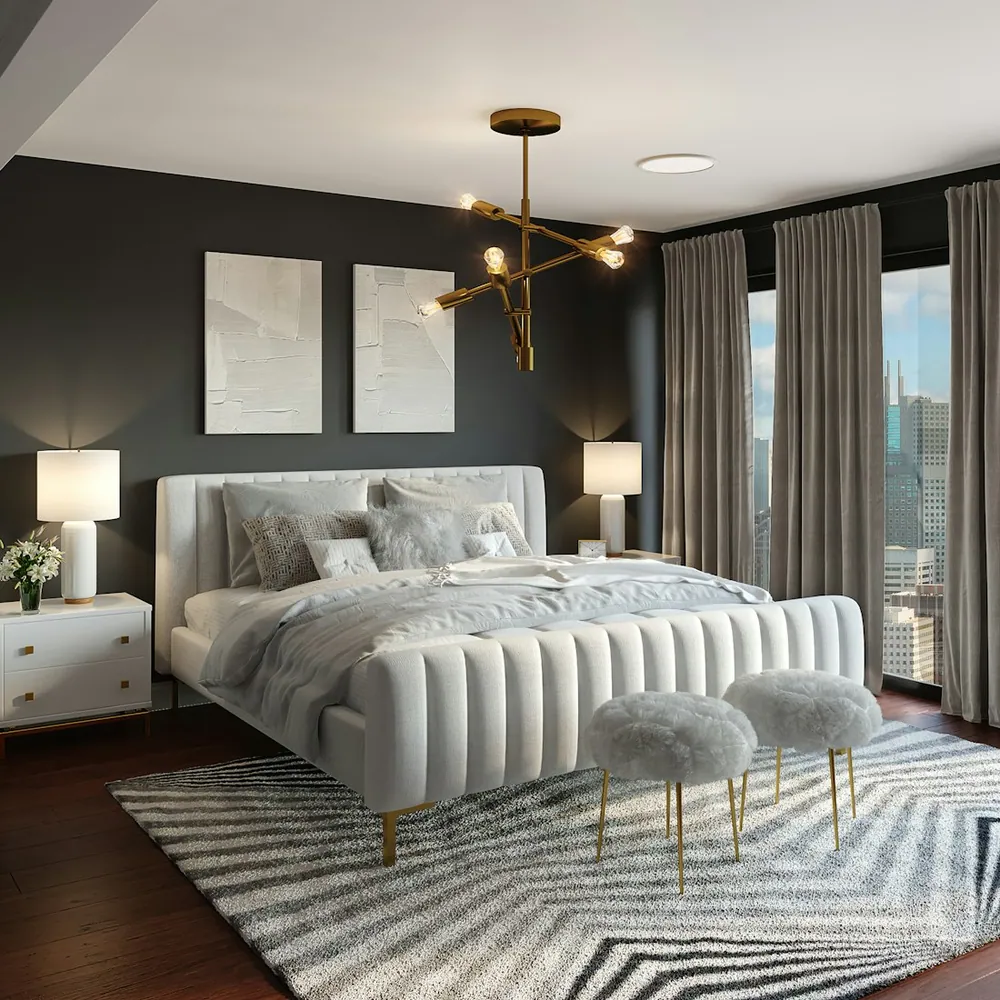Luxury master bedroom with warm lighting and soft finishes